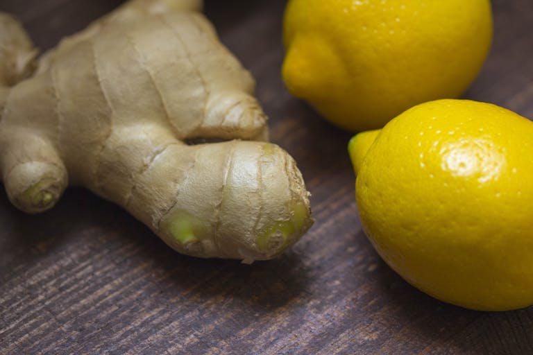 fresh ginger root and lemons